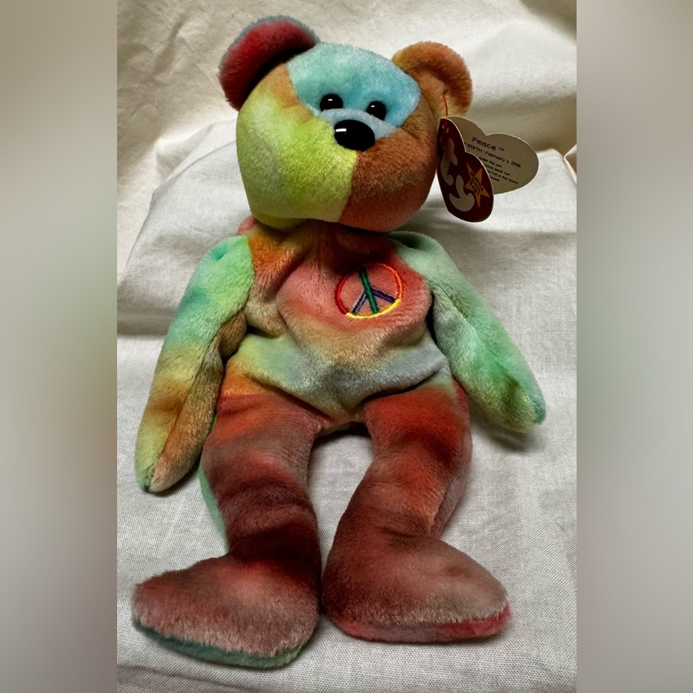 Ty Beanie Baby, Peace the Bear Rare with tags and Errors.